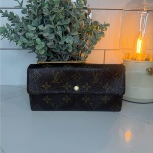 Gently restored authentic Louis Vuitton long wallet